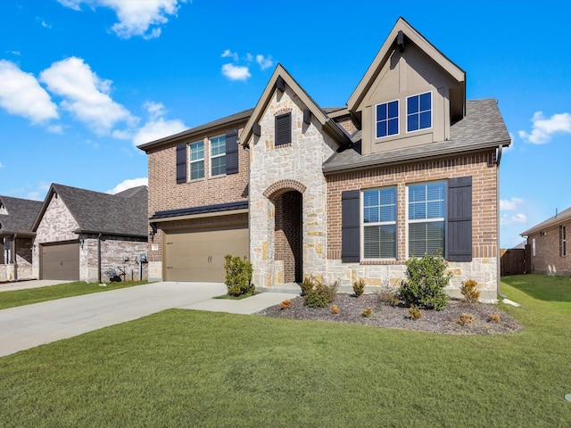 view of front facade featuring a garage and a front yard