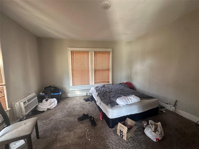 carpeted bedroom with a wall mounted AC