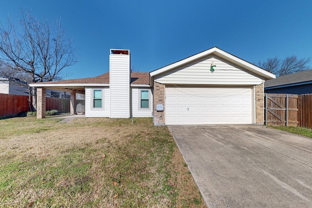 ranch-style house featuring a garage and a front lawn