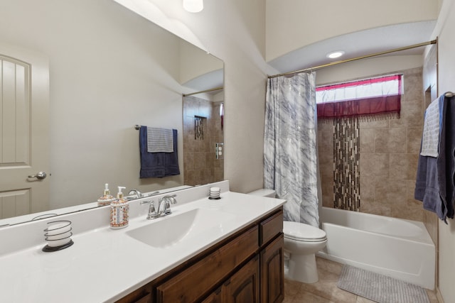 full bathroom featuring tile patterned floors, toilet, vanity, and shower / bath combo