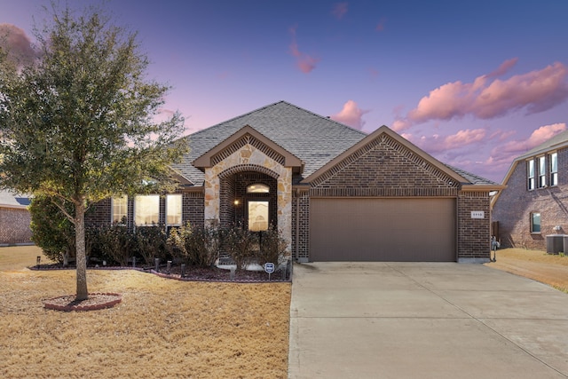 view of front of home featuring a garage