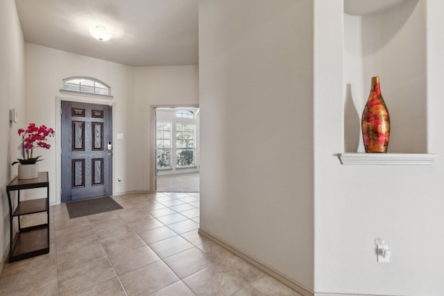 view of tiled foyer entrance