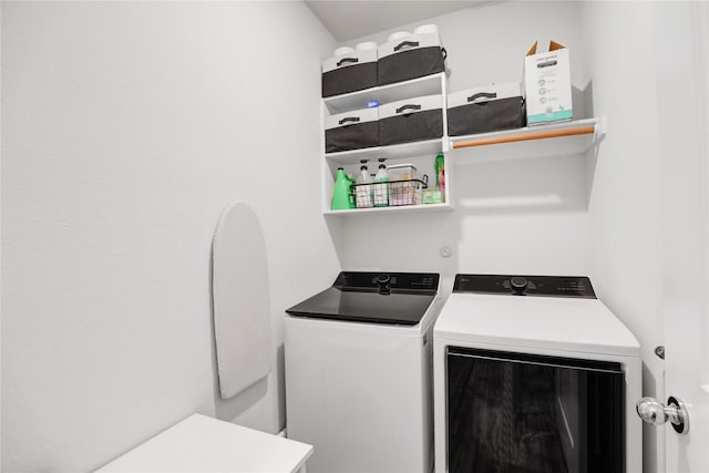 laundry area featuring independent washer and dryer