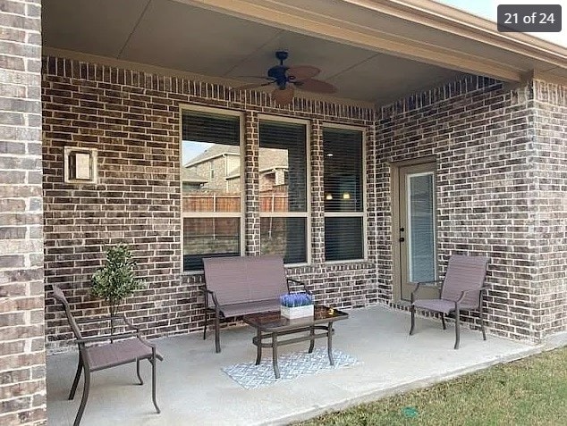 view of patio with ceiling fan