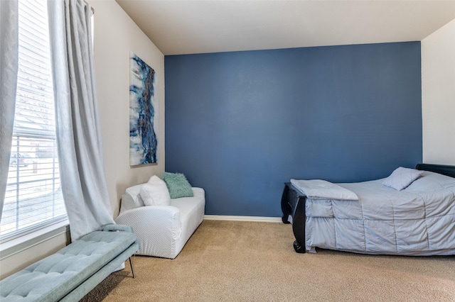 bedroom with light carpet