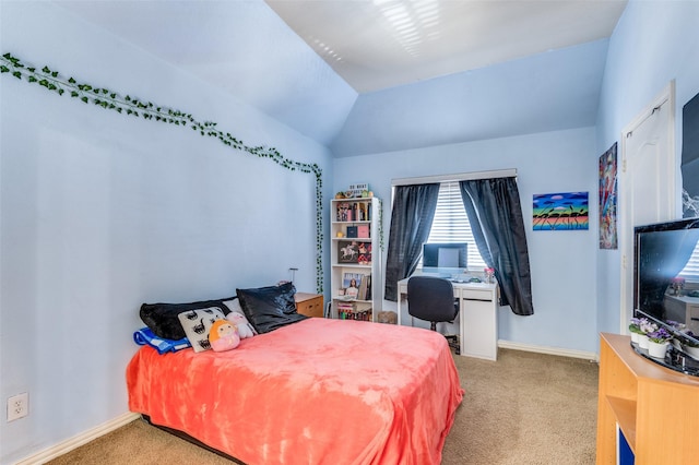 bedroom with light carpet and vaulted ceiling