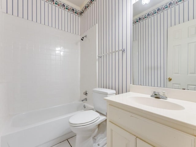 full bathroom featuring washtub / shower combination, vanity, toilet, and tile patterned flooring