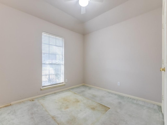 spare room with ceiling fan and carpet floors