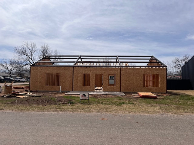 view of side of property with stucco siding