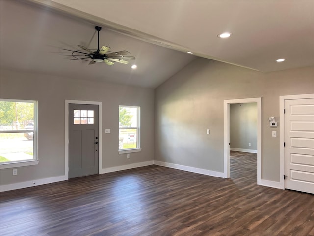 entryway featuring lofted ceiling, dark hardwood / wood-style floors, and ceiling fan