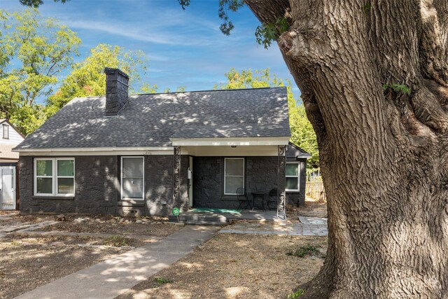 view of front of house with a patio area