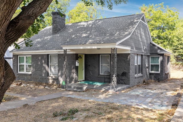 view of front of property featuring a patio