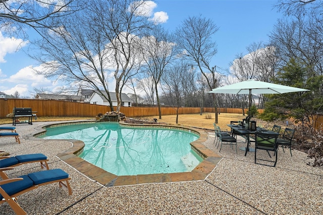 view of pool featuring a fenced in pool, a patio area, and a fenced backyard