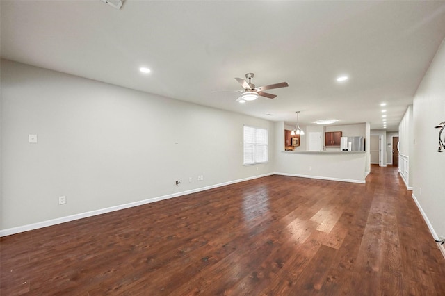 unfurnished living room featuring dark wood-style floors, recessed lighting, baseboards, and a ceiling fan