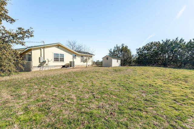 view of yard with a storage shed