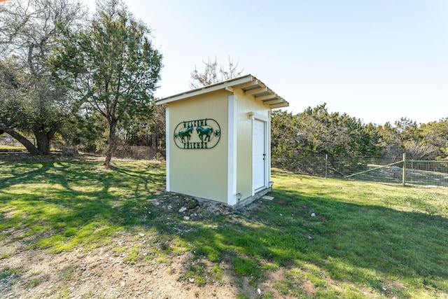 view of outdoor structure with a yard