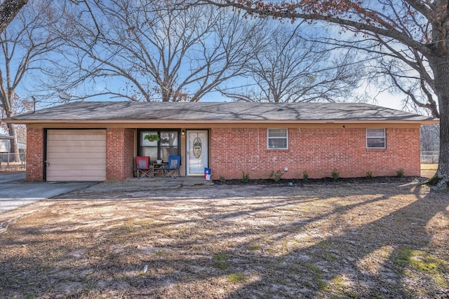 single story home with a garage