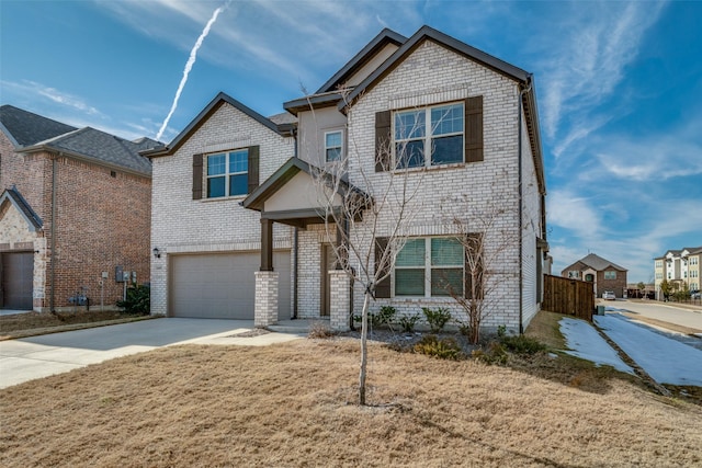 view of front of house with a garage and a front yard