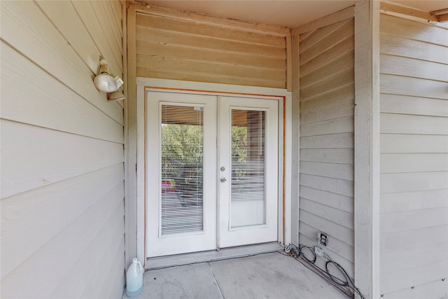 entrance to property featuring french doors