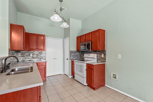 kitchen with sink, backsplash, hanging light fixtures, light tile patterned flooring, and white electric stove