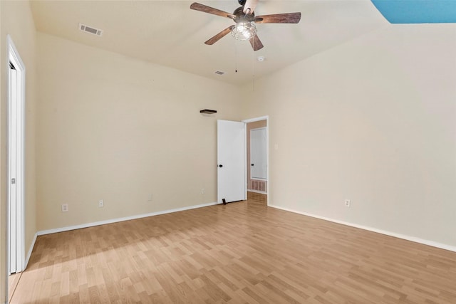 unfurnished room with ceiling fan and light hardwood / wood-style floors