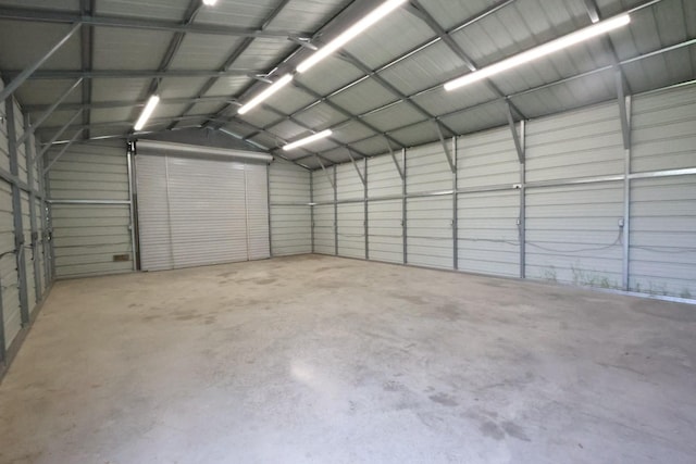 11243 Country Ridge Ln, Forney, TX 75126 - garage featuring metal wall