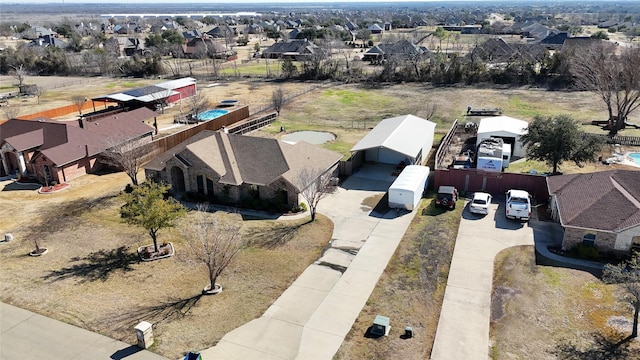 birds eye view of property with a residential view