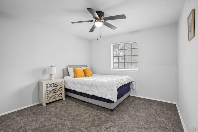 bedroom with dark carpet and ceiling fan