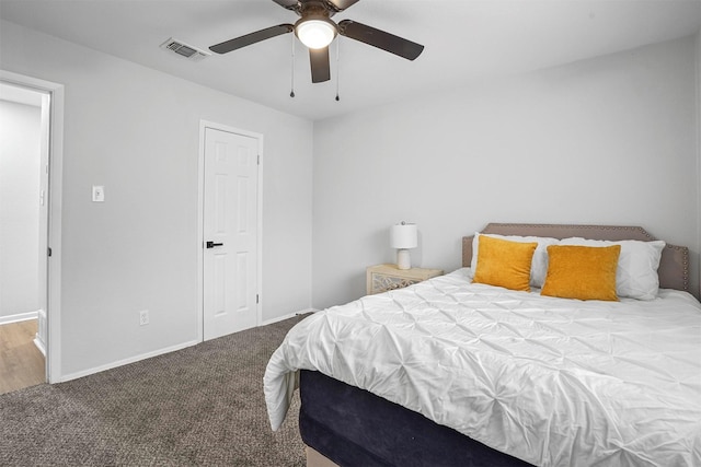 carpeted bedroom with ceiling fan