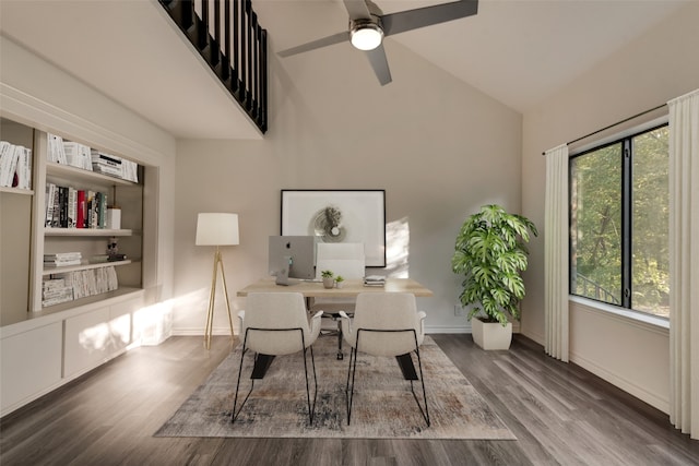 office space featuring vaulted ceiling, dark hardwood / wood-style floors, and ceiling fan