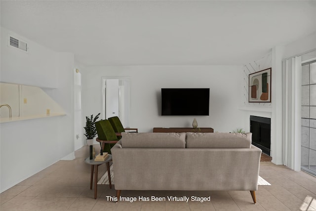 living room featuring light tile patterned floors