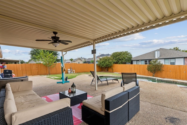 view of patio / terrace with ceiling fan and outdoor lounge area