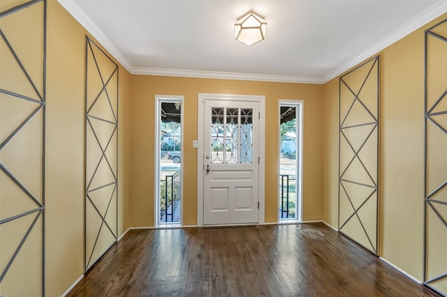 foyer featuring hardwood / wood-style flooring and crown molding