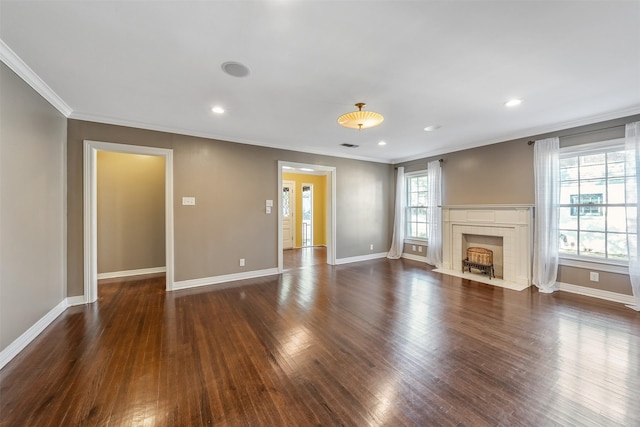 unfurnished living room featuring crown molding and dark hardwood / wood-style floors