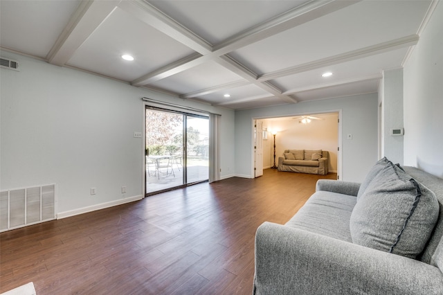 living room with coffered ceiling, hardwood / wood-style floors, and beam ceiling