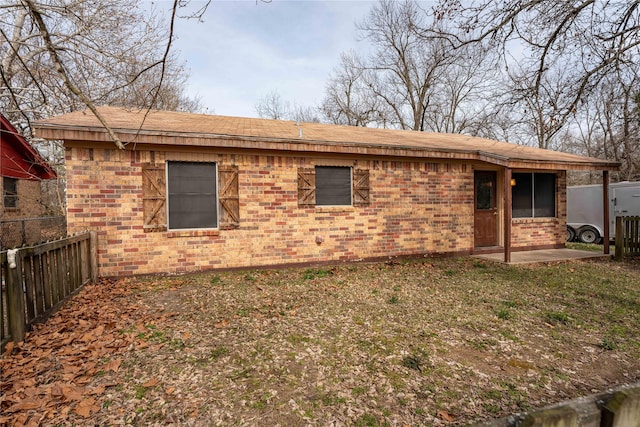 rear view of house featuring a patio area