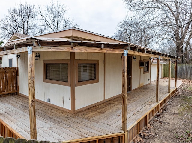 view of home's exterior featuring a deck