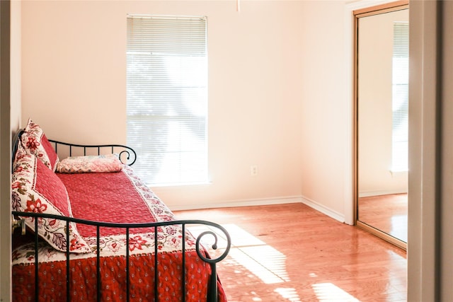 bedroom featuring hardwood / wood-style floors