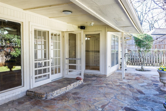 property entrance featuring a patio