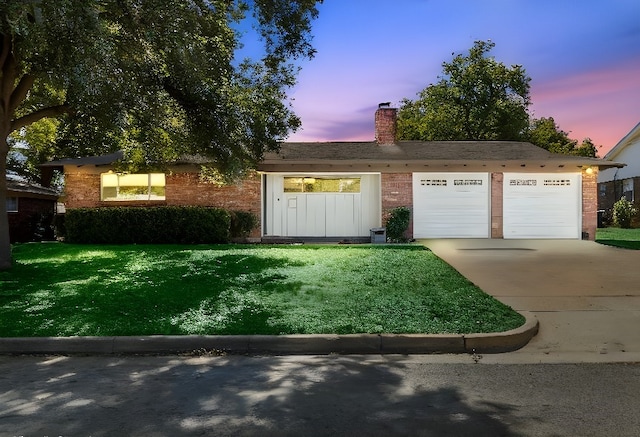 4808 Briarwood Ln, Fort Worth, TX 76103 - view of front of home featuring driveway, brick siding, a front lawn, and a chimney