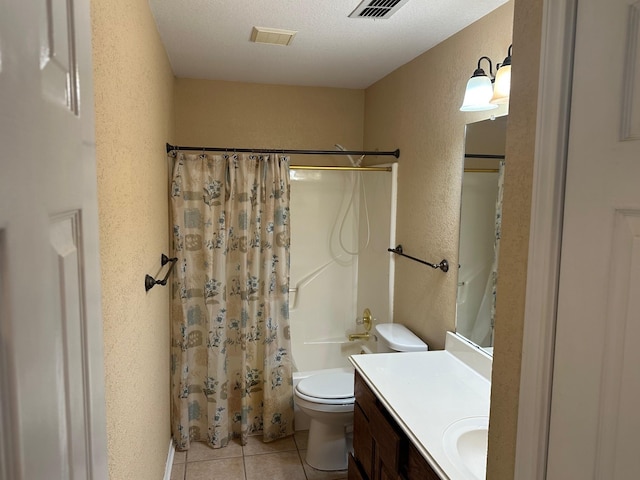 full bathroom with tile patterned flooring, vanity, toilet, a textured ceiling, and shower / bath combo with shower curtain