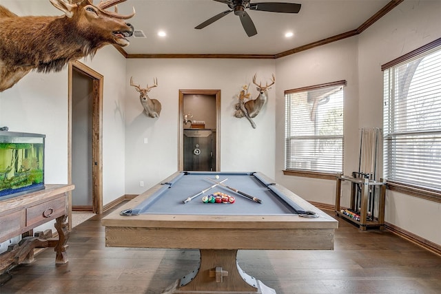 playroom with dark hardwood / wood-style flooring, crown molding, billiards, and ceiling fan