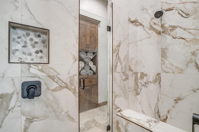 bathroom featuring tiled shower