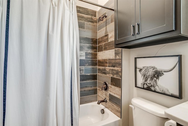 bathroom with shower / tub combo with curtain and toilet