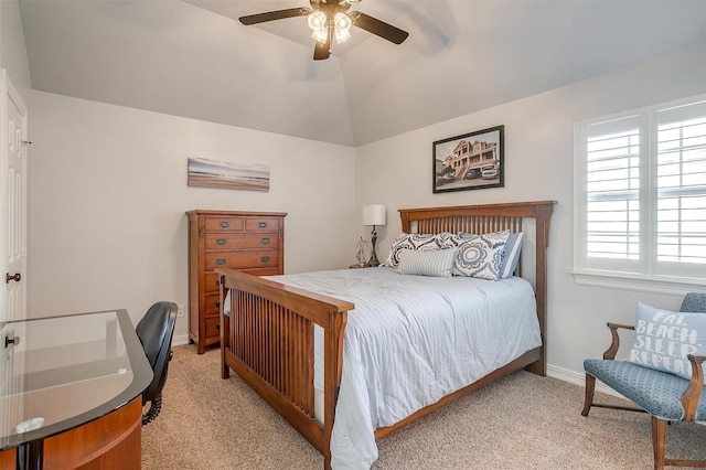 bedroom with light carpet, vaulted ceiling, and ceiling fan