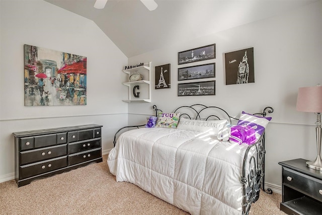 bedroom with lofted ceiling, carpet, and ceiling fan