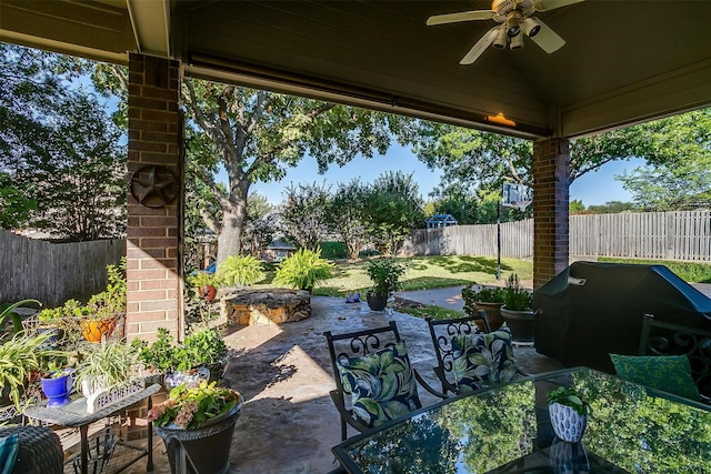 view of patio / terrace with ceiling fan and grilling area