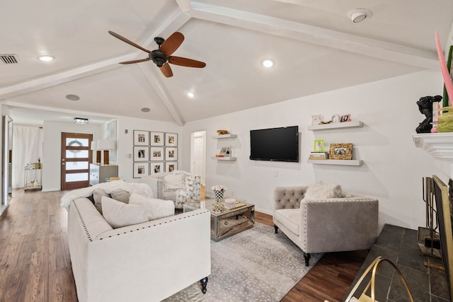 living room featuring dark wood-type flooring, ceiling fan, and vaulted ceiling with beams