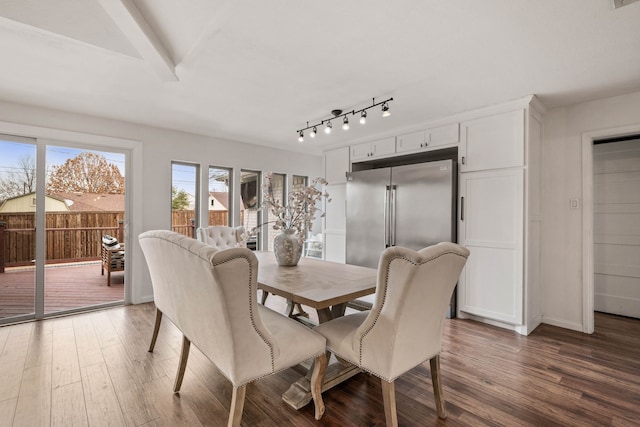 dining room with dark wood-type flooring