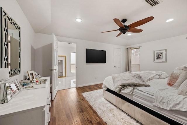 bedroom featuring dark hardwood / wood-style floors and ceiling fan